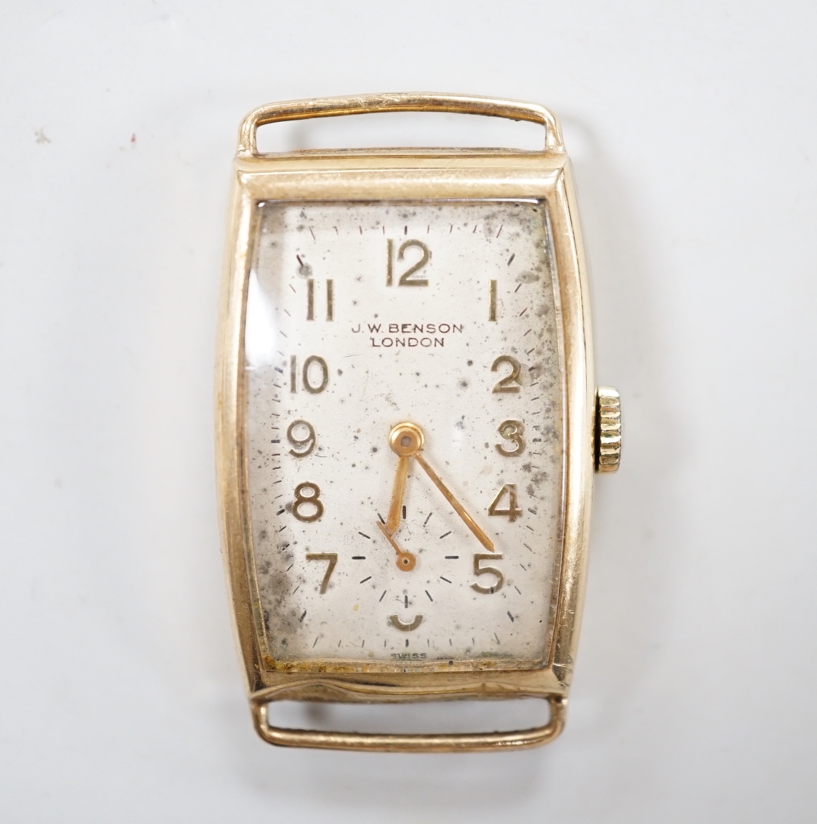 A gentleman's early 1950's 9ct gold J.W. Benson manual wind curved rectangular wrist watch, with Arabic dial and subsidiary seconds, case diameter 22mm, gross weight 16.3 grams, no strap.